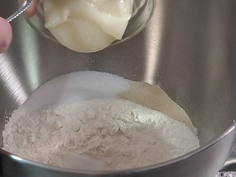 Adding in tangzhong into mixing bowl