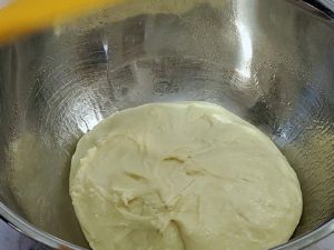 Dough inside of large bowl
