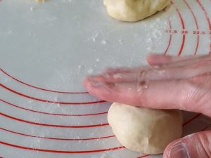 Rolling dough on countertop