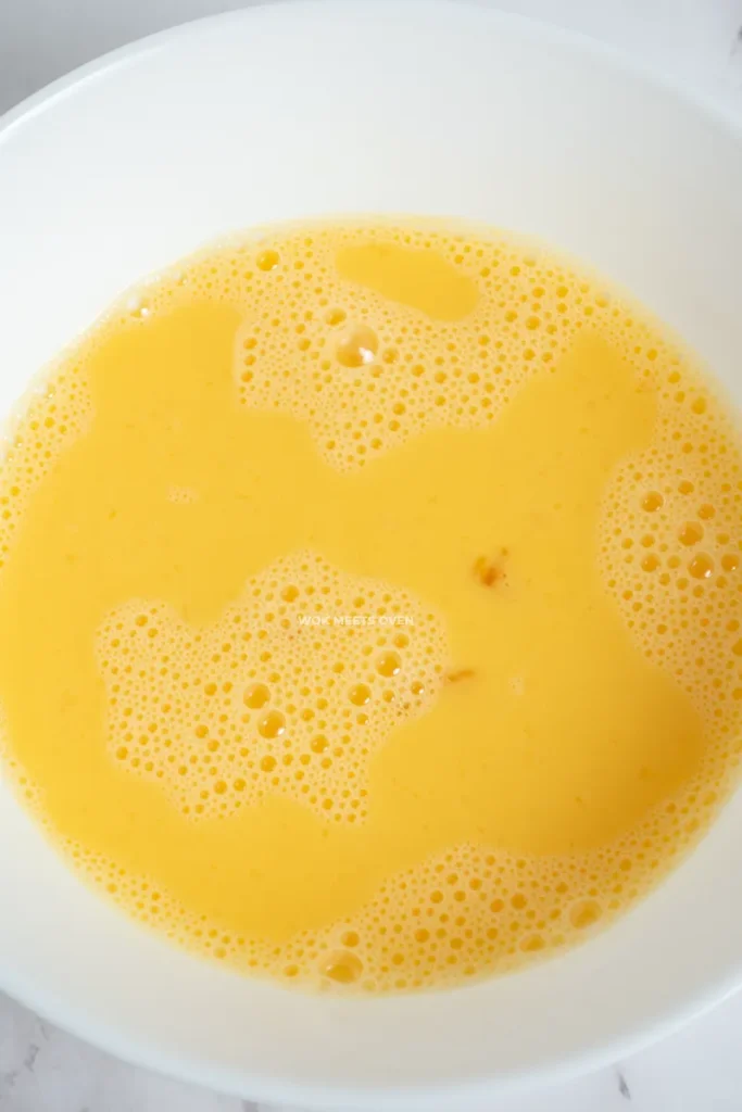 Eggs whisked in bowl