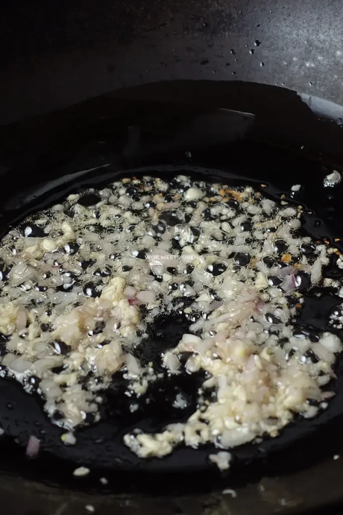 stir-frying shallots and garlic with bacon oil