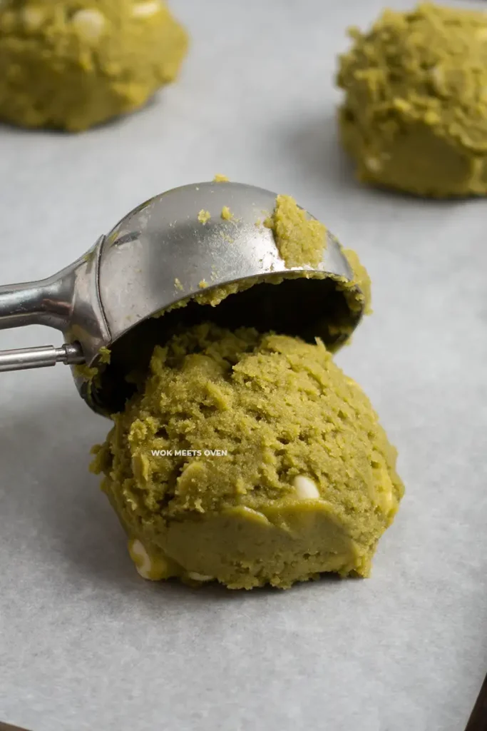 Placing cookie dough onto baking tray