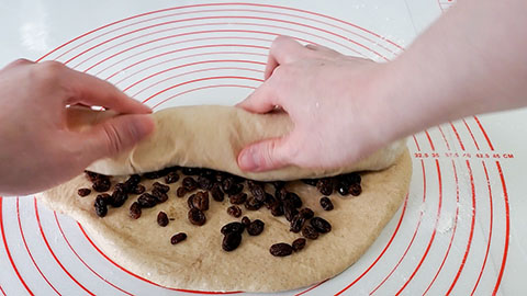 rolling dough on countertop