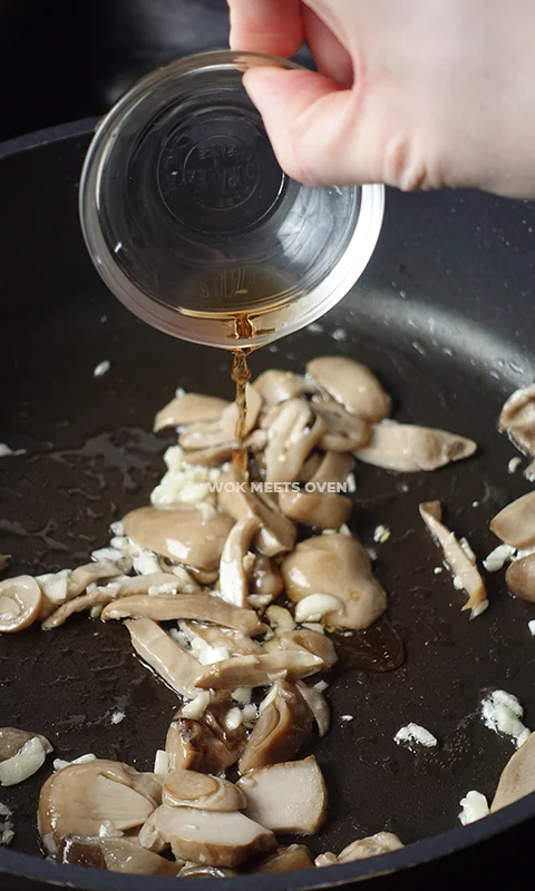 Adding in cooking wine to wok