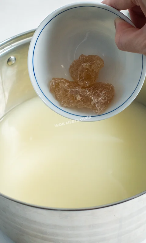 adding rock sugar to pot