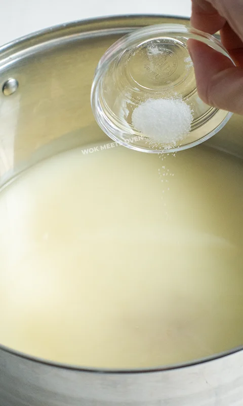 Adding in table salt into pot