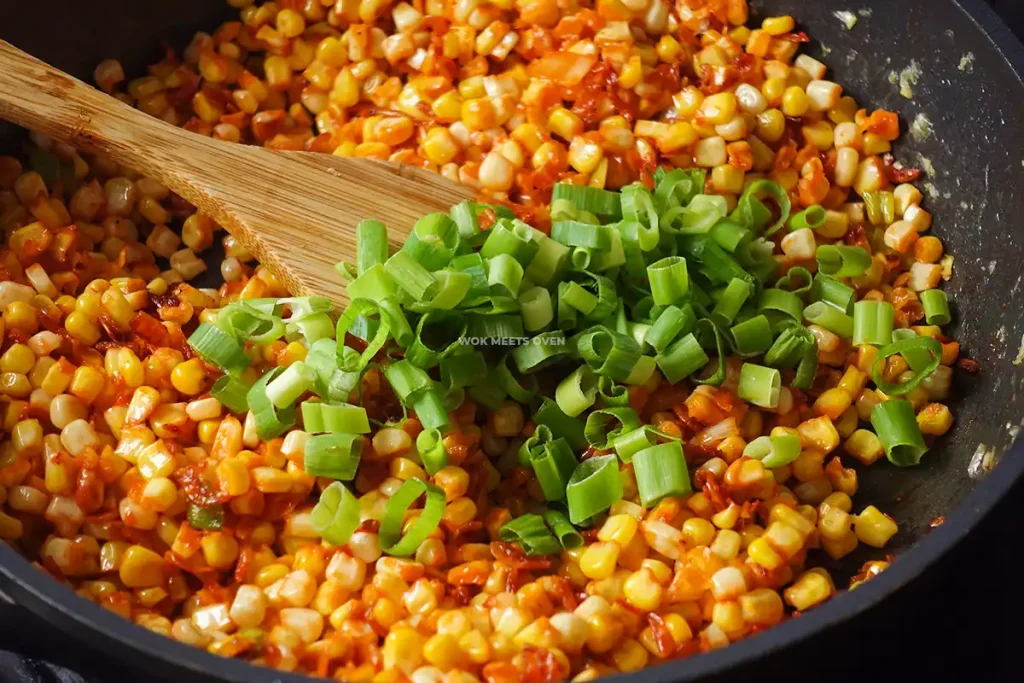 Adding in green onions