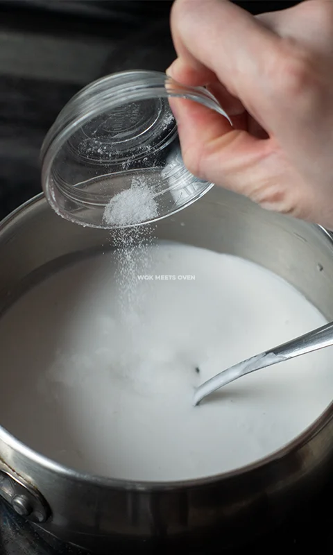 Adding in salt into pot
