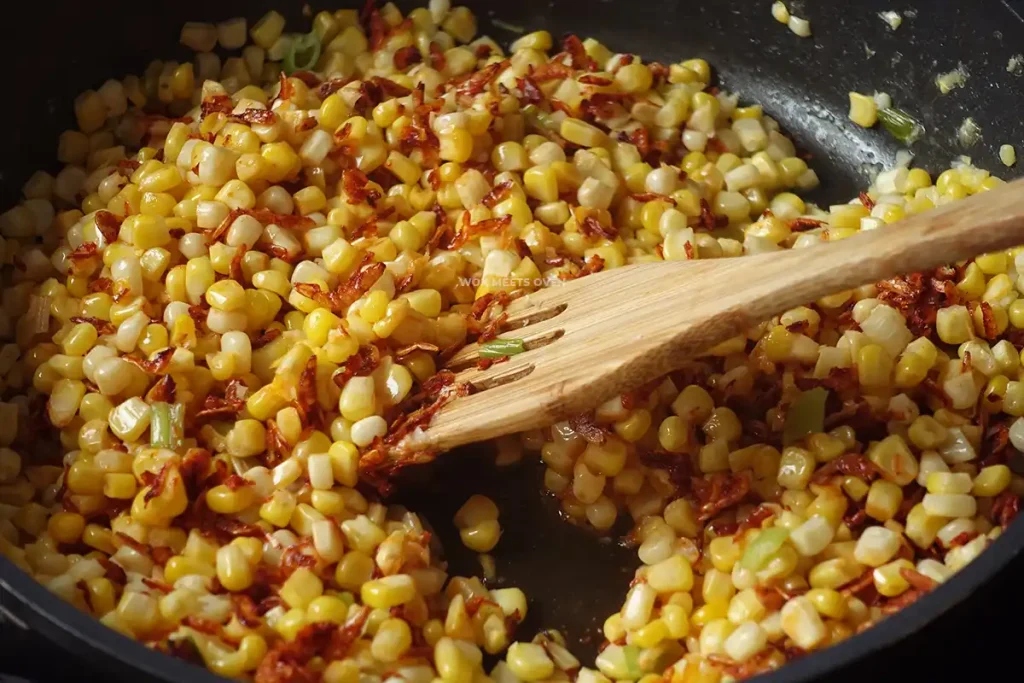 Stir-frying dried shrimp with corn kernels