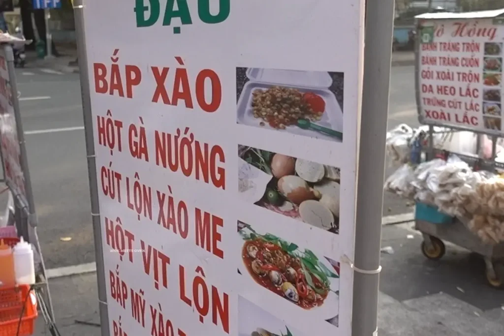 Sign advertising stir-fried corn in Vietnamese