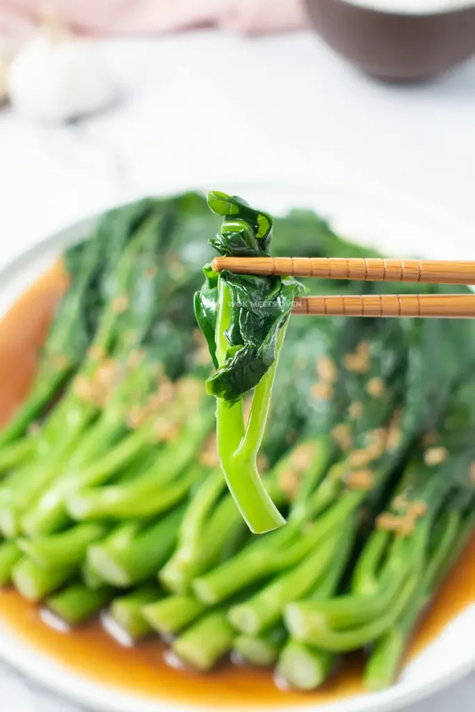 Blog image of Gai Lan on chopsticks