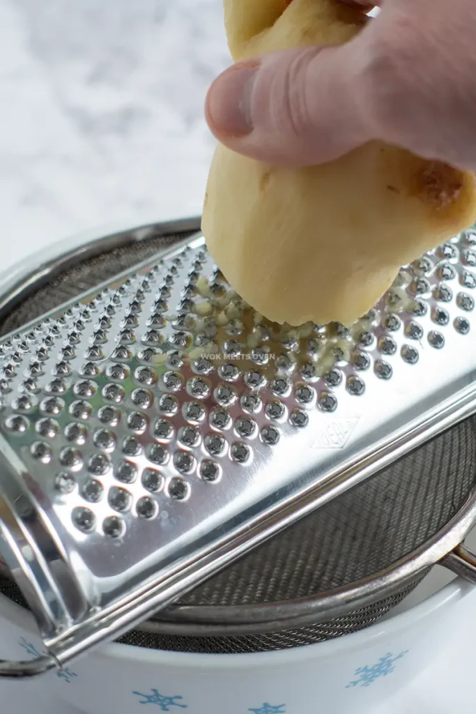 Grating fresh ginger