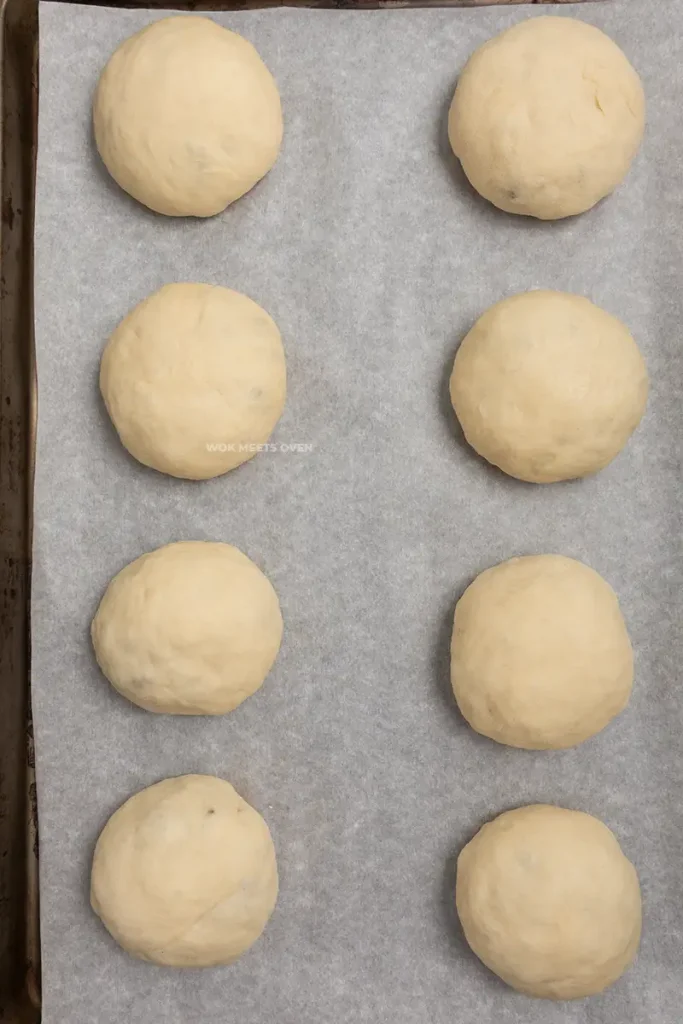 Finished shaped buns on baking tray