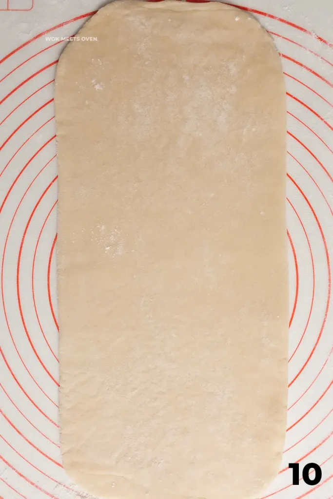 Rolling out the dough into a long rectangle again