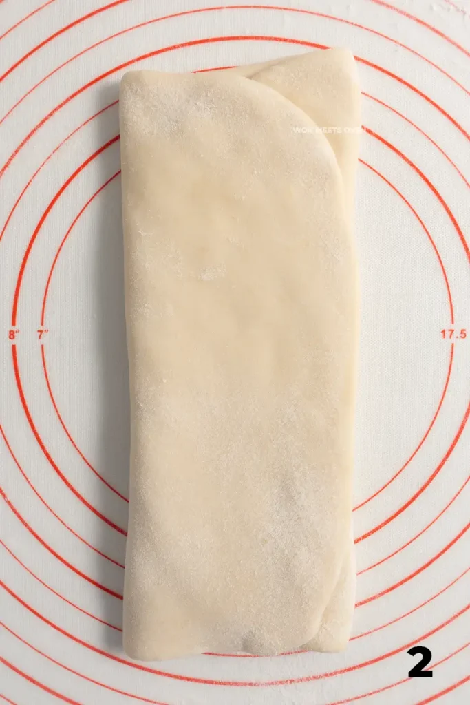 Folding dough into thirds: left side