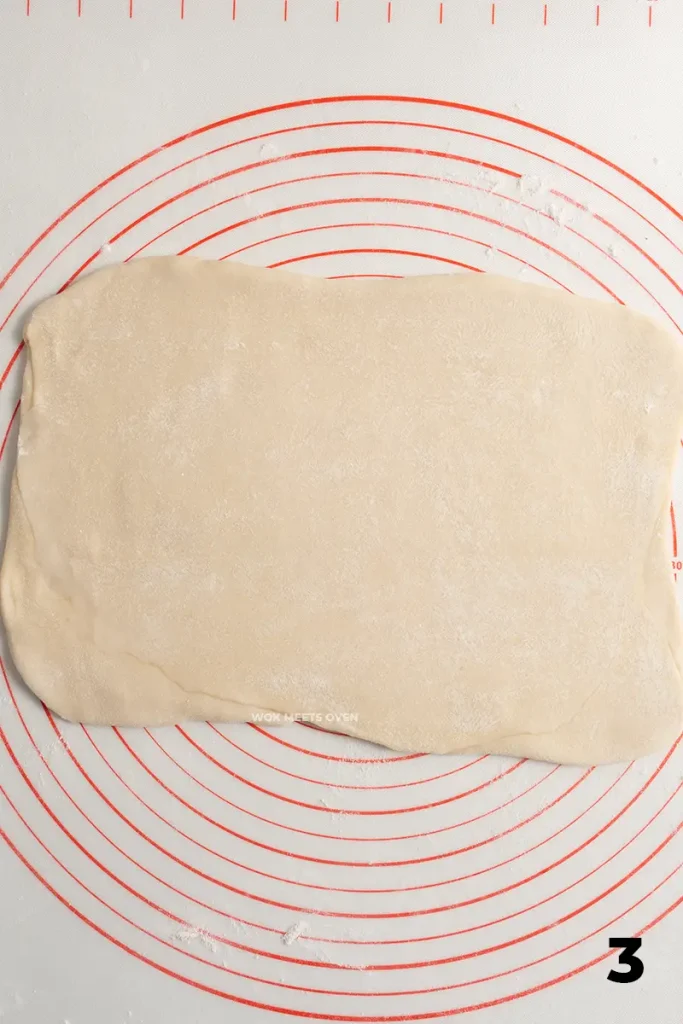 Rolling out dough again into rectangle