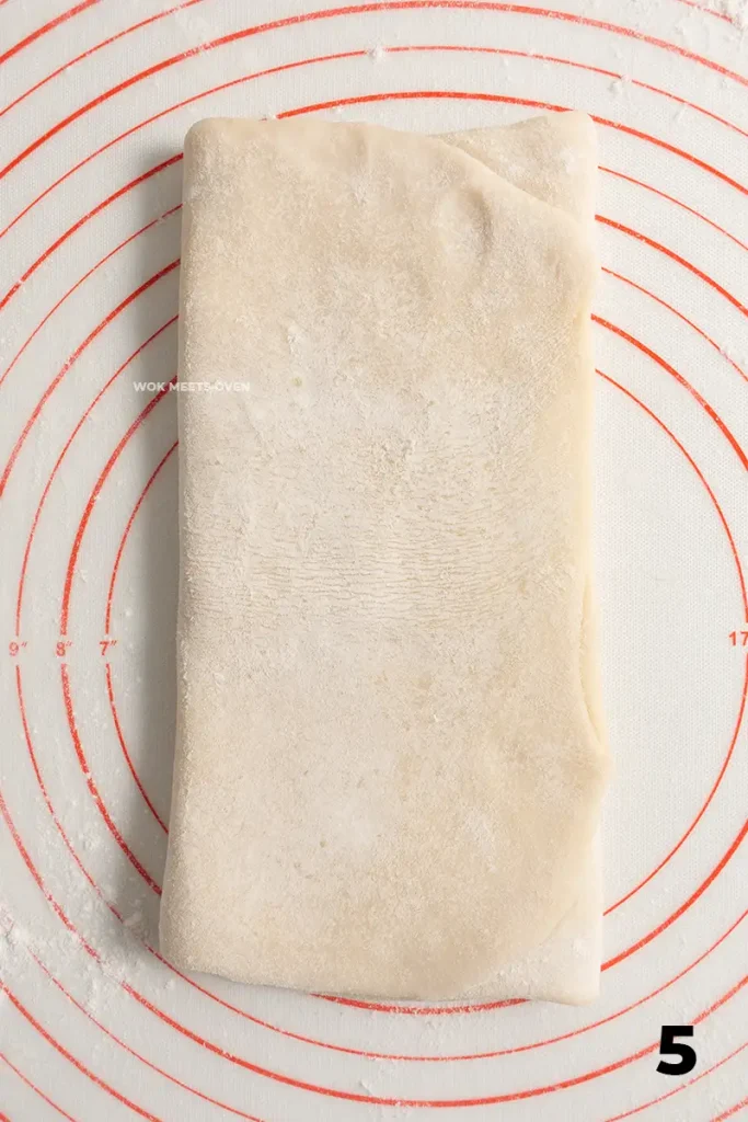 Folding left side on top of right side