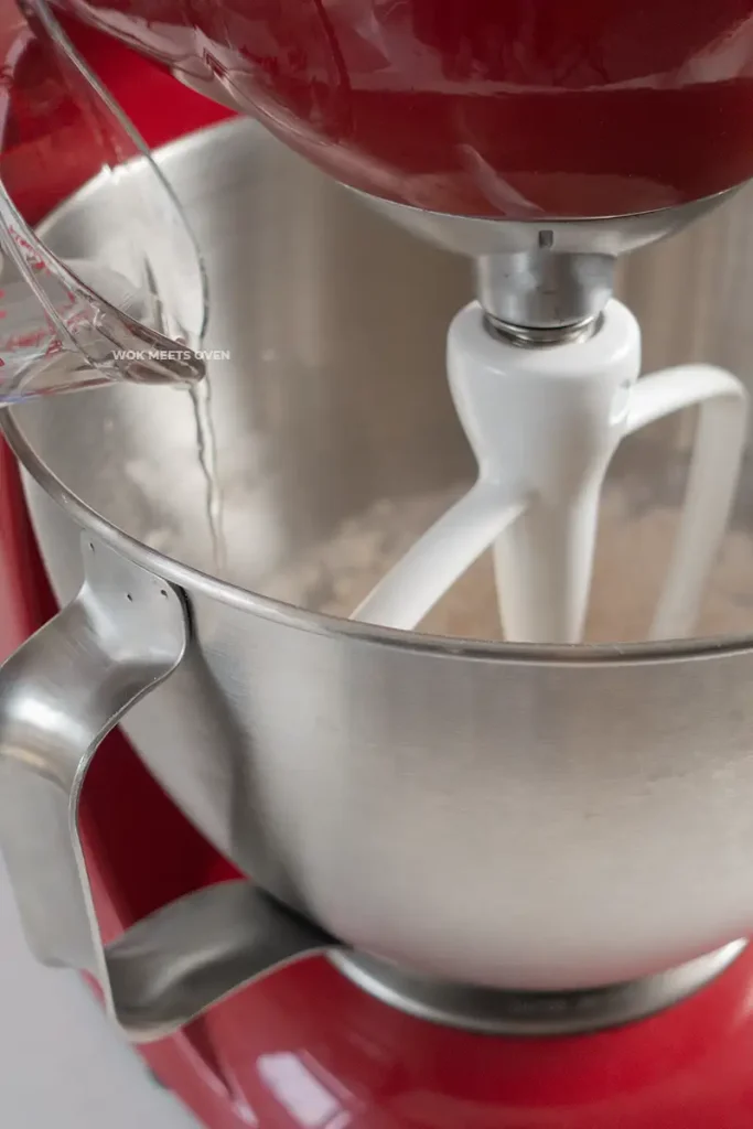 Adding water into stand mixer