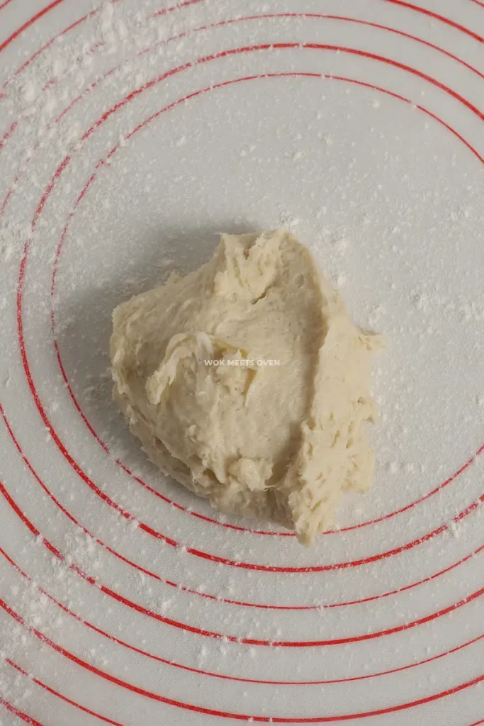 Water dough on countertop with flour sprinkled