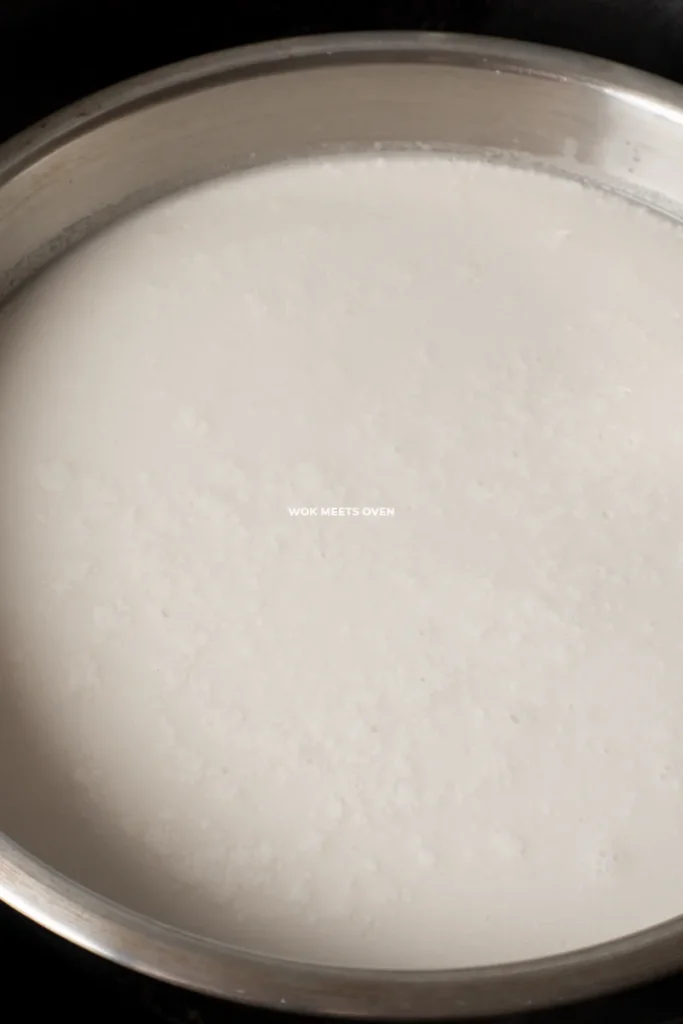 Placing pan into steamer