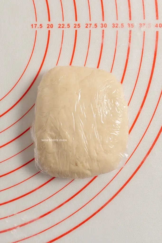 Water dough covered with plastic wrap