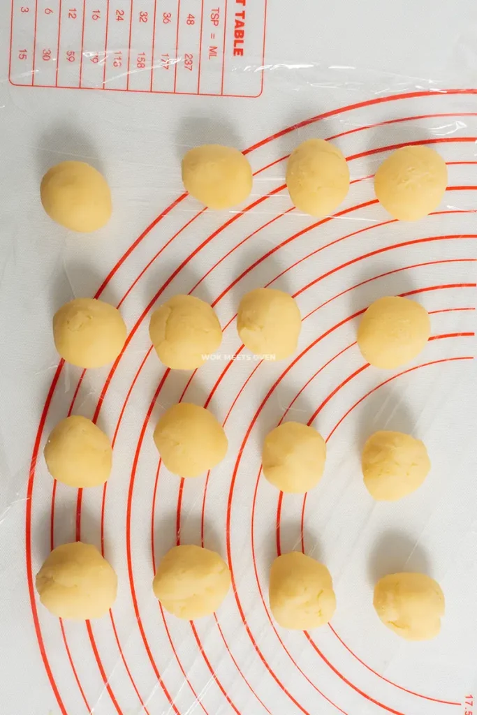 Custard filling shaped into 16 balls