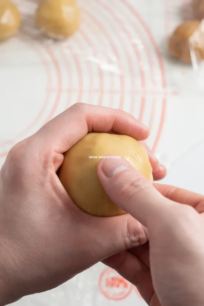 Flipping the dough and filling over