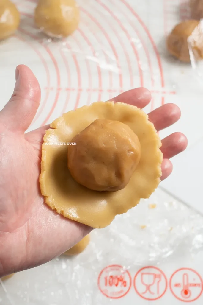 Adding in filling to center of dough