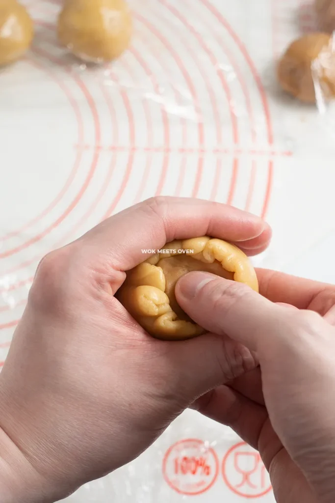 Wrapping dough over filling pic 2