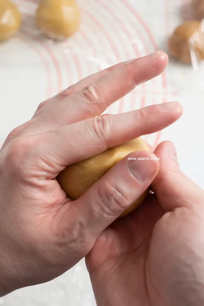 Wrapping dough over filling pic 4