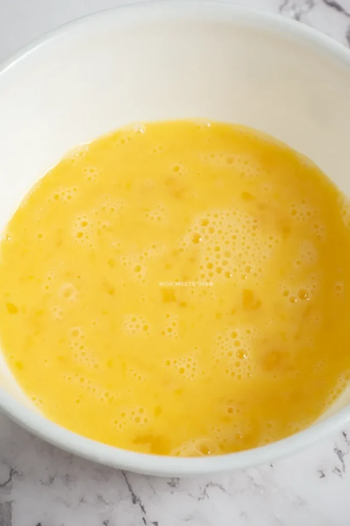 Eggs whisked in bowl