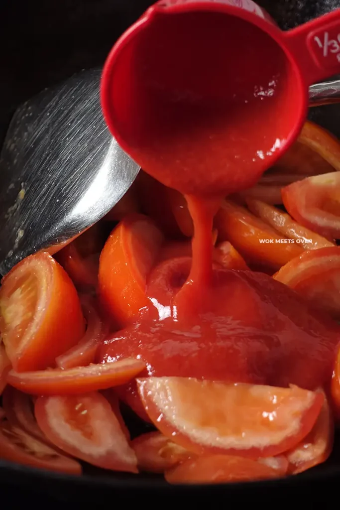 Adding in tomato sauce