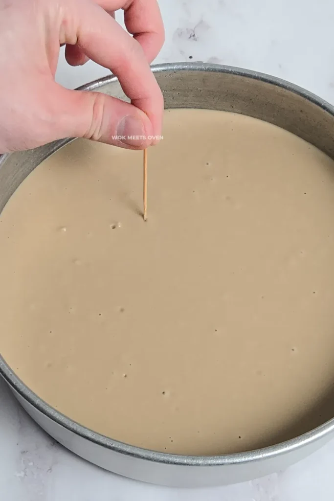 Popping air bubbles with a toothpick