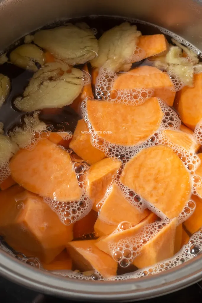 Sweet potatoes added to pot of water