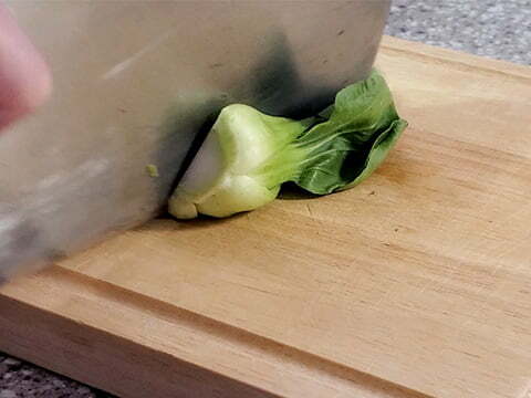 Cutting Bok choy in half