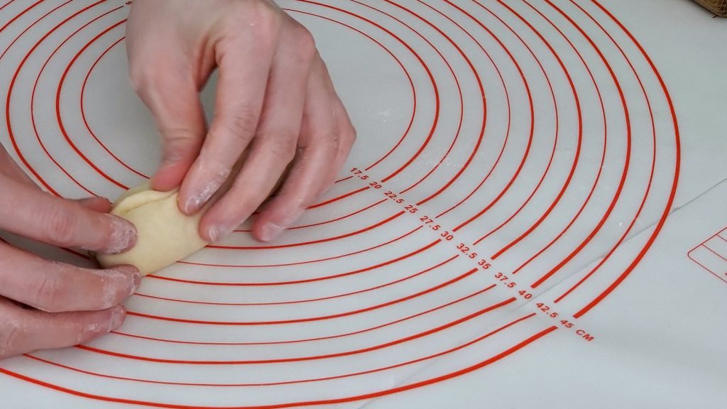 Pinching rolled dough