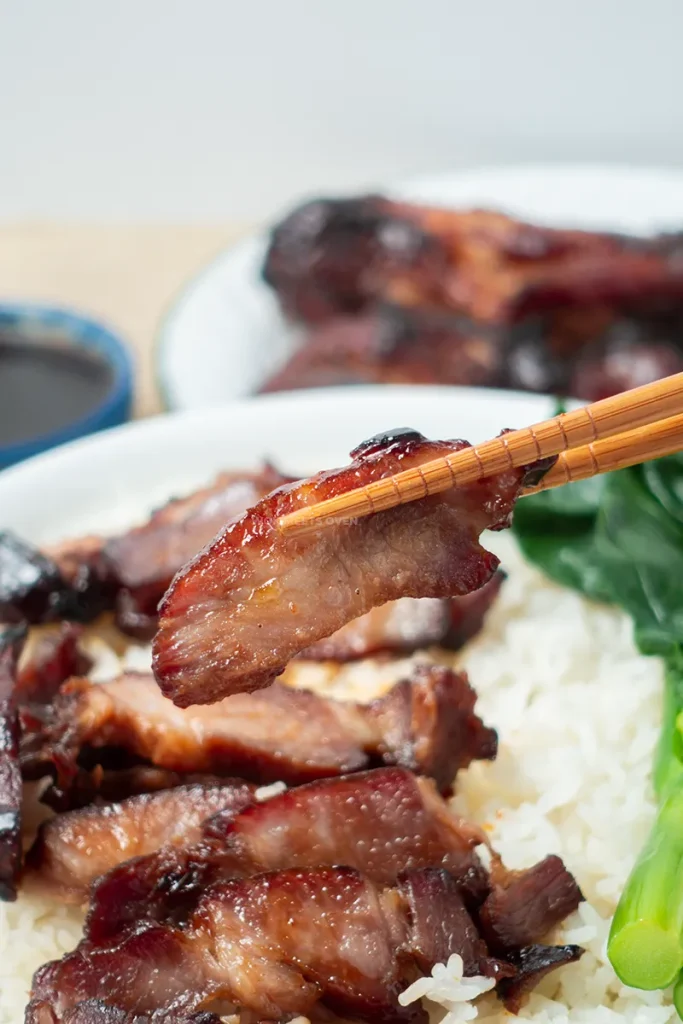 Picture of char siu and chopsticks