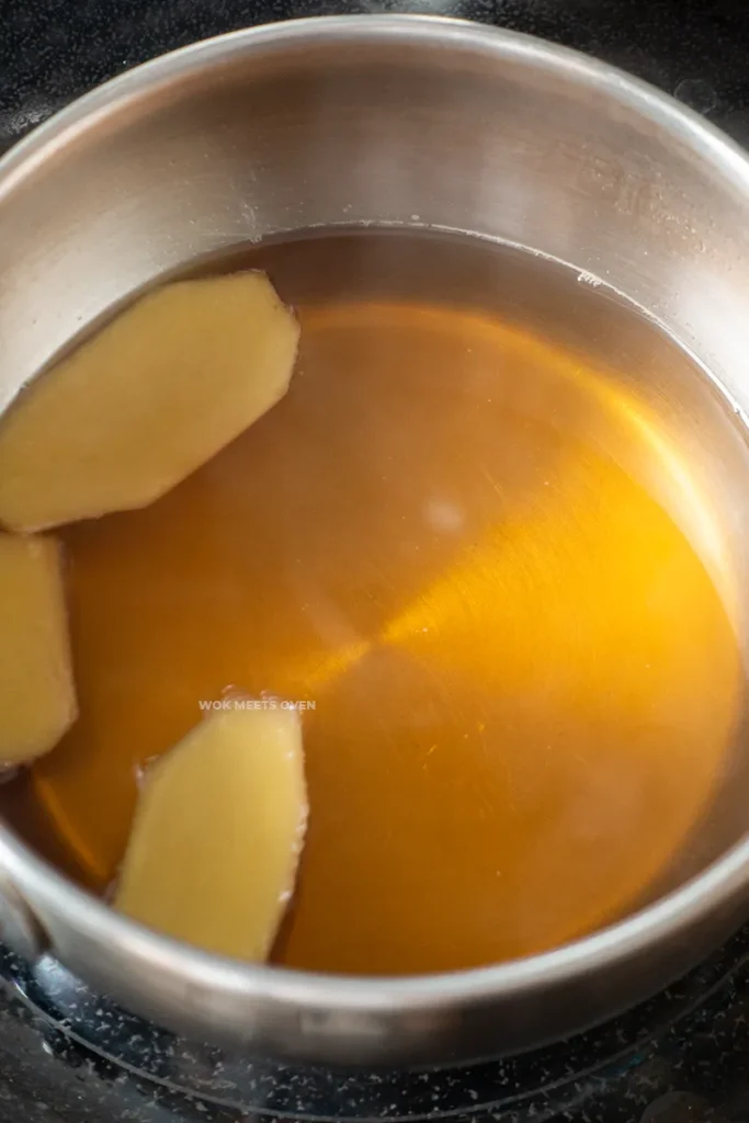 Shot of finished ginger sugar syrup in sauce pan