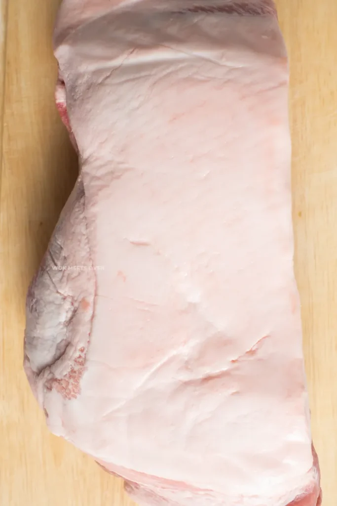 Piece of pork shoulder with skin on