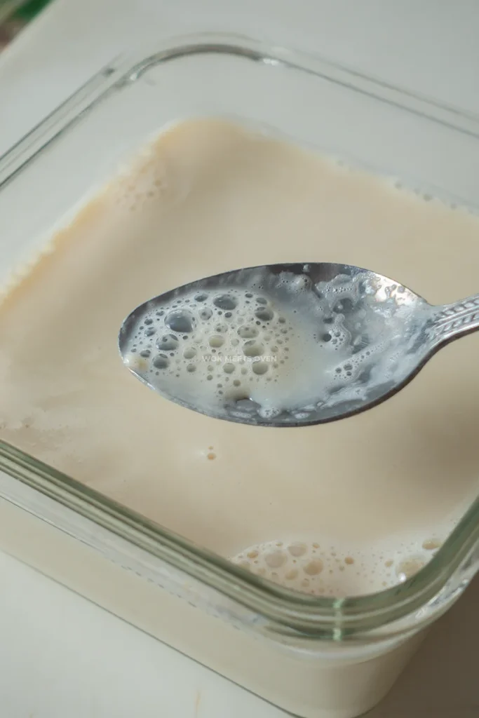 Scooping out bubbles using a spoon