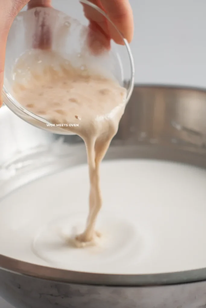 Pouring yeast into rice flour mixture