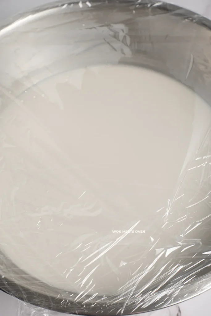 Rice flour mixture covered with plastic wrap