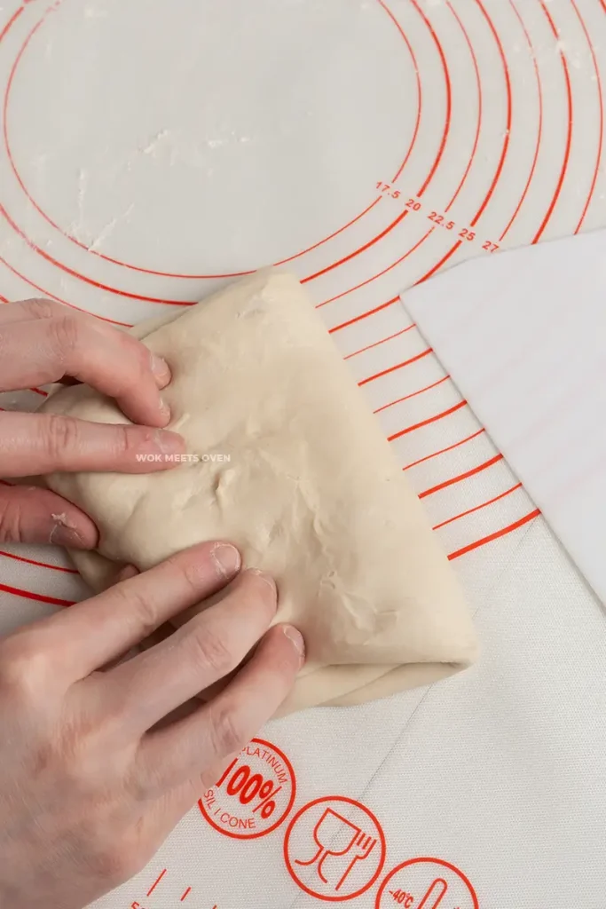 Hand kneading dough pic 1