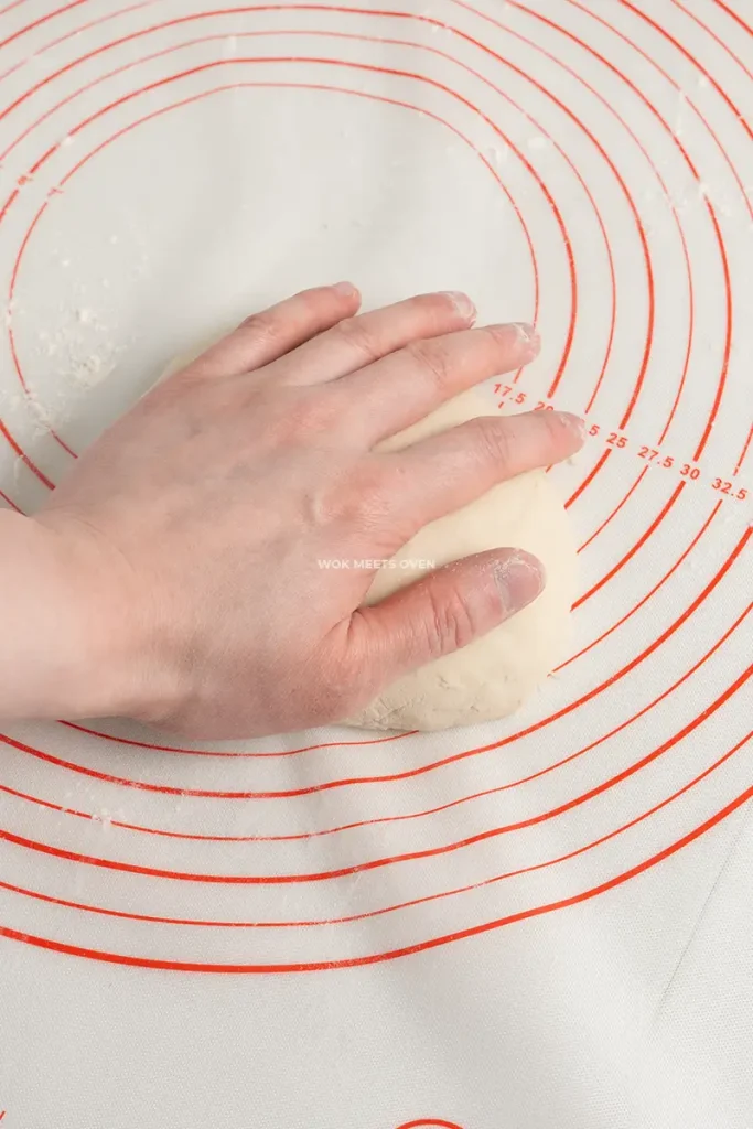 Hand kneading dough pic 4