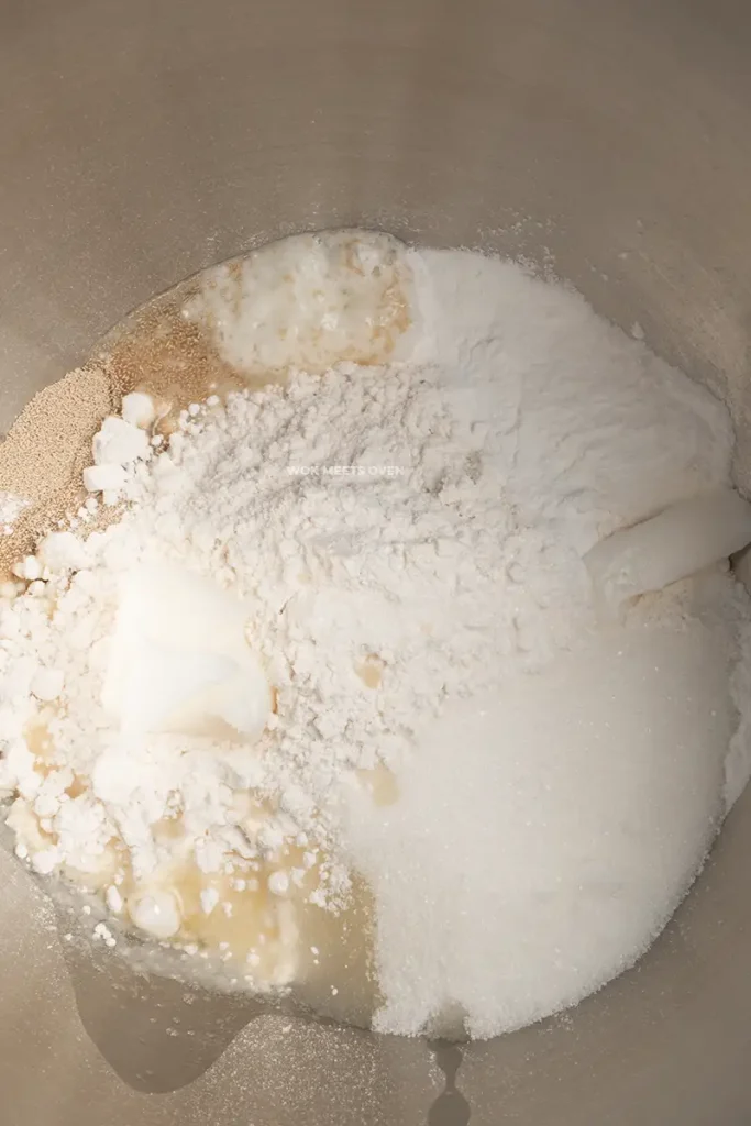 Dough ingredients inside of mixing bowl