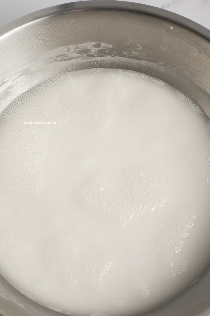 Rice flour mixture has bubbles and fizzing on top