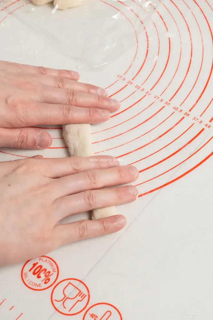 Rolling dough into a long strip