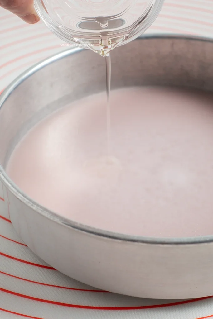 Pouring oil onto purple sweet potato snow skin dough