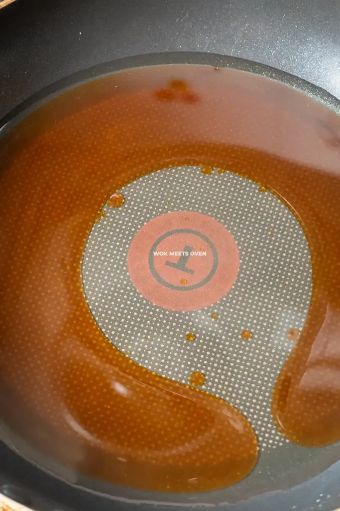 sugar caramelized in oil in frying pan