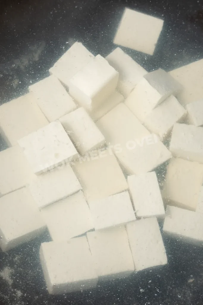 Blanching tofu in hot water